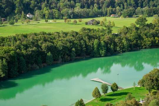 Scenic Turquoise Lake in Lush Green Landscape