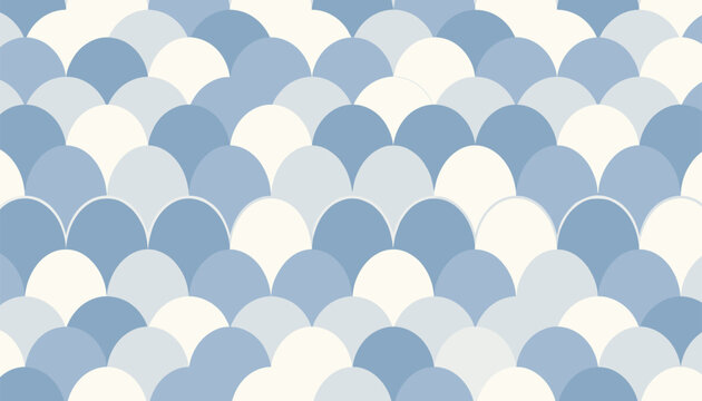 Repeating seamless pattern of delicate blue and white fish scales creating a beautiful wave texture background.