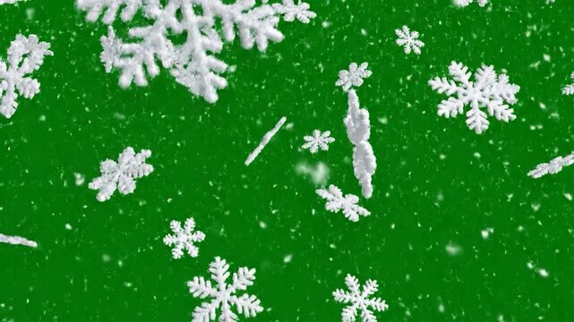 White snowflakes fall against a solid green background