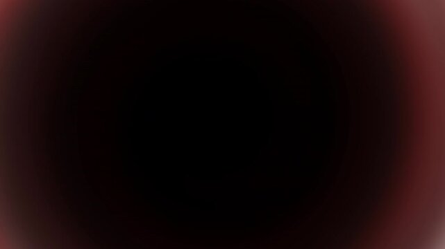 Red black round mesmerizing spiral gradient background featuring smooth circular motion and bold abstract depth