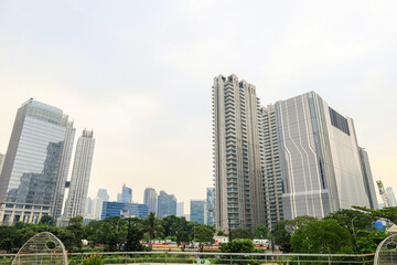 Fototapeta premium Wide View Of A Metropolitan Skyline Features Towering Modern Skyscrapers And Highrise Buildings