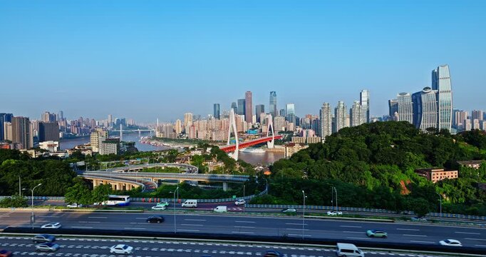 Modern suspension bridge across the Yangtze River with city skyline in Chongqing, China