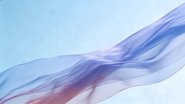 Flowing fabric against blue sky