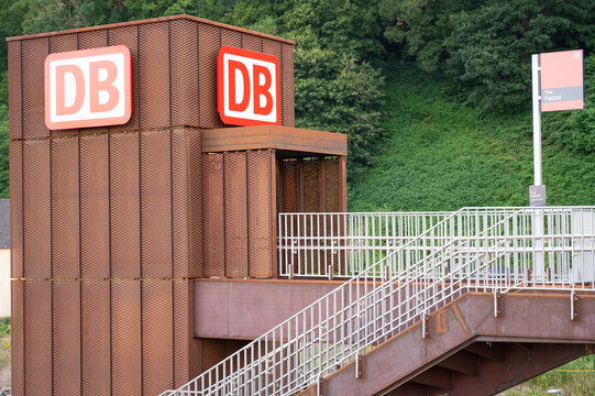 Train DB railroad sign, railway station in Trier, Germany, modern public transportation, infrastructure in city