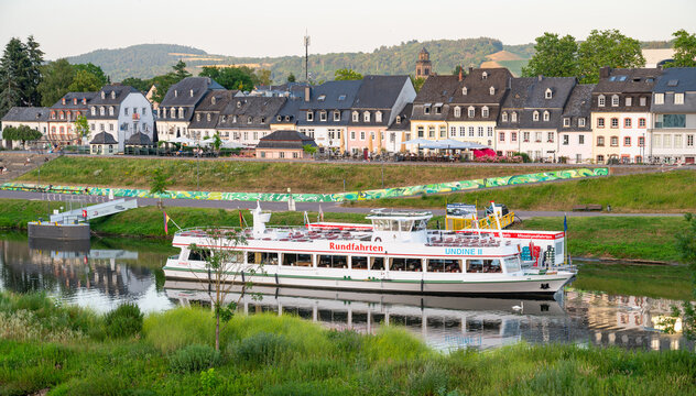 Excursion boats at Zurlauben riverbed in Trier, Germany, Moselle river and ancient roman city, Mosel valley landscape in summer, travel destination