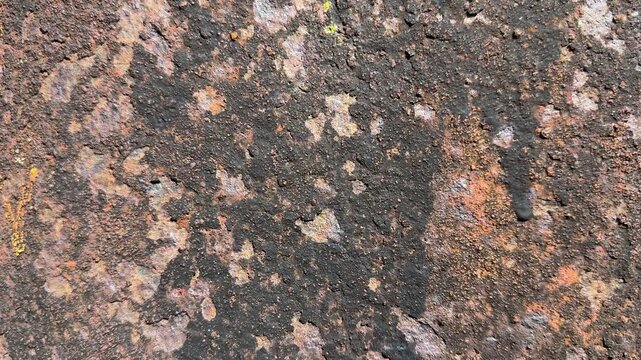 Background of paint flaking and rust panning shot movement wallpaper and abstract colour and surface.