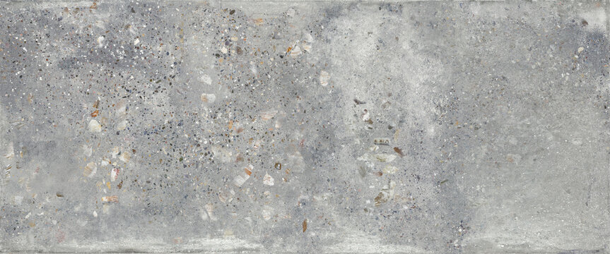 Gray terrazzo concrete texture background with natural stone fragments and industrial cement surface details. Modern architectural material featuring rough terrazzo patterns, neutral tones, and realis