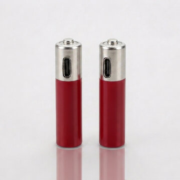 Two red rechargeable AAA lithium batteries with built-in USB-C charging ports on a white background