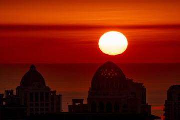 Obraz premium Sunrise Aerial view of Porto Arabia Peral Qatar. Artificial island 