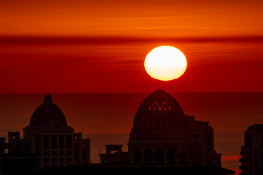 Sunrise Aerial view of Porto Arabia Peral Qatar. Artificial island	