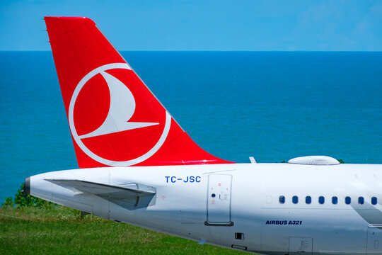 Close up of Airbus A321 tail section with prominent Turkish Airlines red logo