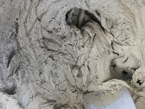 Fresh cement based mortar mix with performance additives and plasticizers for durable tile installation and masonry