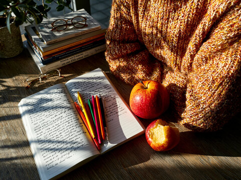 Cozy Home Study Workspace with Notebook, Pencils and Apples &ndash; Remote Work, Education and Productive Lifestyle