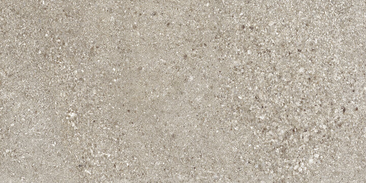 Grey terrazzo texture with natural stone particles and beach sand inspired earthy surface pattern. Rustic architectural background with warm neutral tones.