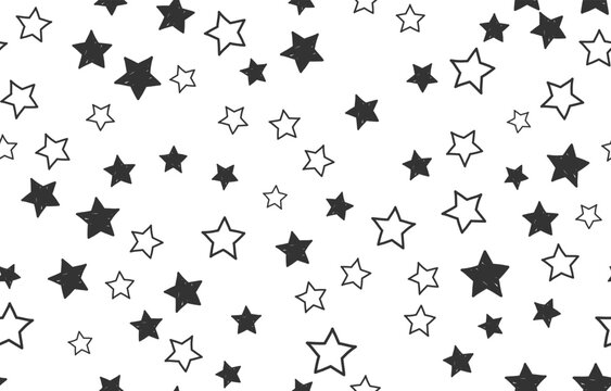 Seamless pattern featuring various hand drawn stars in filled and outlined styles scattered across background