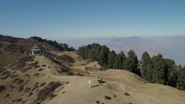 Aerial view of a scenic mountain ridge with pine forest in Chakrata, Dehradun, Uttarakhand, India