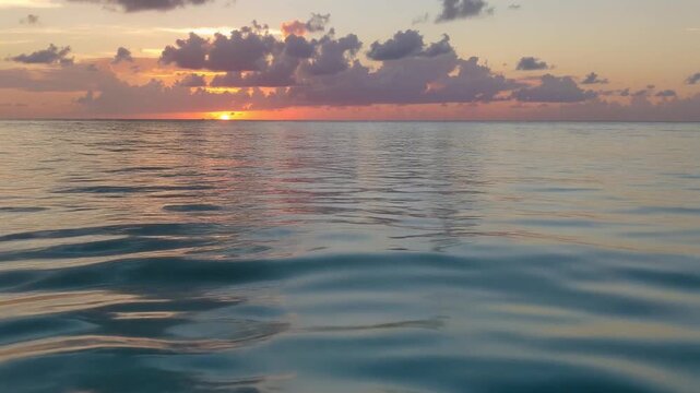 Radiant ocean surface sparkling with gentle ripples creating peaceful marine panorama through retreat