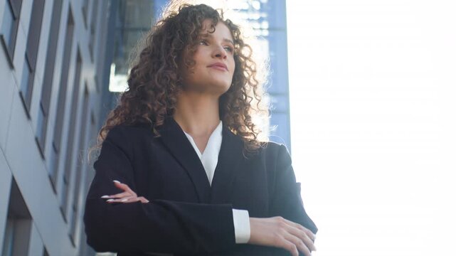 Caucasian business woman dreaming thinking feeling inspiration posing in city in sunlight sunbeams pensive dreamy businesswoman female girl manager looking at sun employer dream think in sunshine