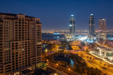 Fototapeta premium Beautiful Aerial View of Pearl Qatar. Roundabout Pearl Qatar at sunset time. 