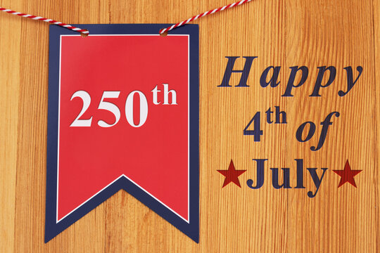 250th Anniversary  message with retro USA red and blue star banner on wood
