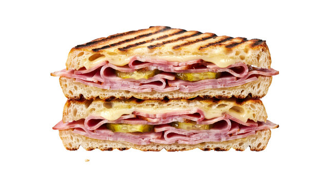 Delicious toasted ham and cheese panini sandwich featuring melted swiss cheese and sliced pickles served on rustic sourdough bread presented in a crisp on transparent background