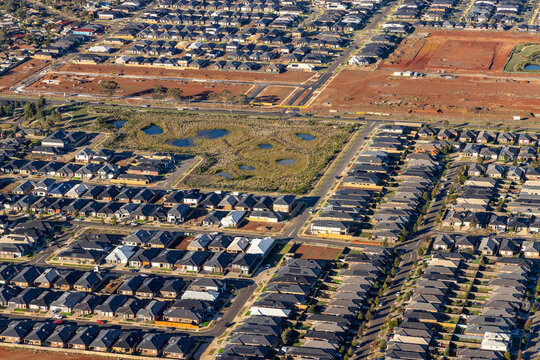 Weir Views aerial view of residential housing and suburban streets and new developments, Victoria Australia
