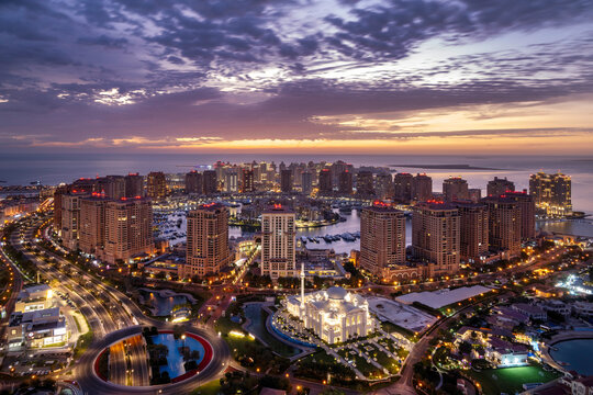 Beautiful Aerial View of Pearl Qatar. Roundabout Pearl Qatar at sunset time.	