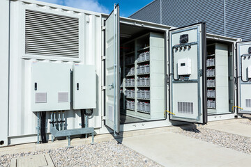 Modern energy storage system with battery containers and electrical components © Snide12