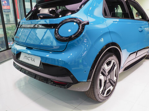TOKYO, JAPAN - April 29, 2026: A Nissan Micra on display in the Ginza Place Nissan Crossing showroom.