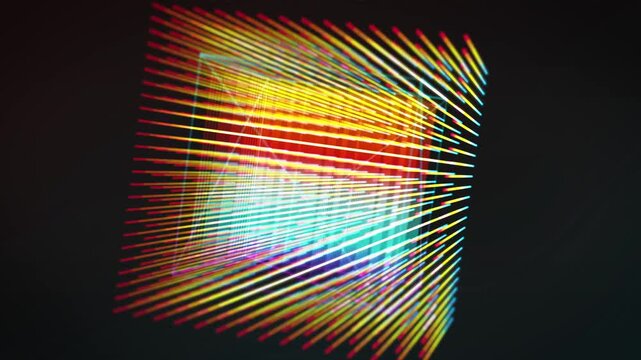 Rotating wireframe cube glows in vivid spectrum colors against dark space, sleek motion graphics look built for corporate intros and innovation branding