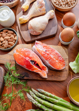 Top view of various healthy food ingredients, meat, fish, cereals and vegetables