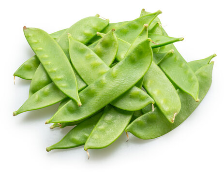 A loose pile of fresh, young green snow peas in pods, isolated on a white background.