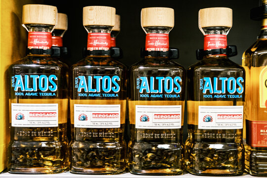 Supermarket Display of Bottles of Olmeca Altos Agave Alcoholic Tequila Drinks With No People