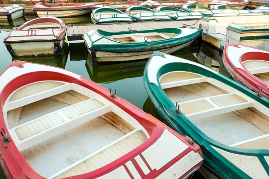 Colorful Rowboats on Water