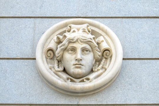 Classical Female Face Relief on Stone Facade