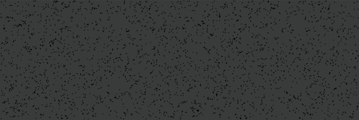 Fototapeta premium Vector seamless pattern with scattered black irregular speckles on dark gray.