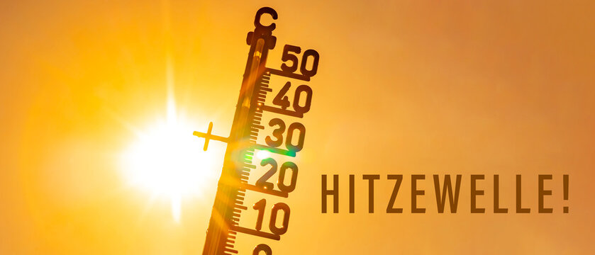Hitzewelle, Hitze Klima Klimawandel Wetter - Thermometer , Hintergrund gelber Himmel mit Sonne