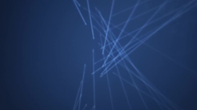 White laser beams moving across night sky
