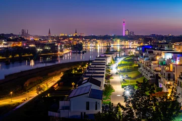 Night panorama of Dortmund Germany. Former blast furnace site and new recreational area in Hoerde called “Phoenixsee“. TV-Tower and skyline. © ON-Photography