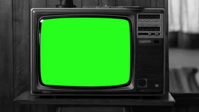 Vintage Television Box with Bright Green Screen Display in Black and White, Zoom In - 4K