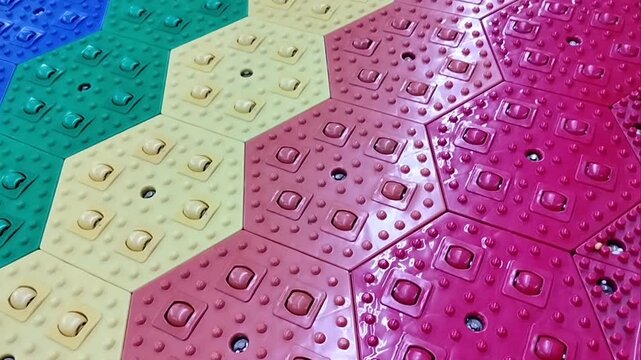 Colorful rainbow interlocking plastic tiles track for dry ski tubing slide in playground