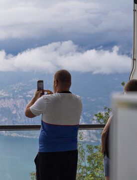 A man make photo from upper sation of mountain called  balto in garda lake