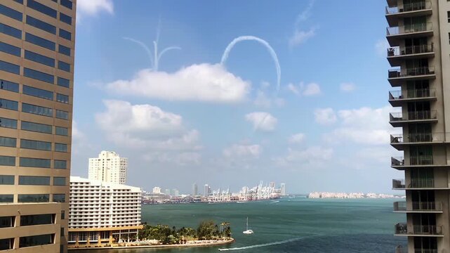 Air Show Smoke Trails In Blue Sky Framed By Miami Skyscrapers - 4K