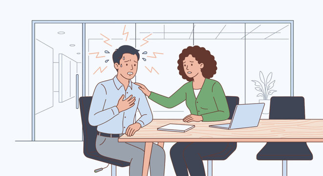 Stressed man having a panic attack at work being comforted by a colleague
