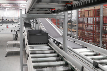 Fototapeta premium logistic warehouse. packing line in a logistics warehouse