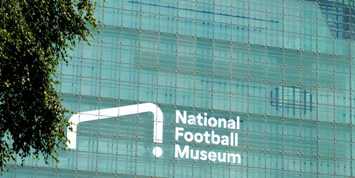 Manchester, England, UK - 18 June 2026: National Football Museum sign on glass facade of Urbis building in Manchester, modern architectural exterior with institution logo