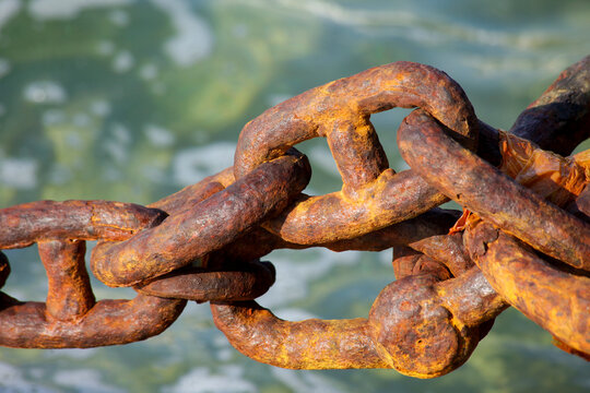 Rusty Chain Detail by the Water