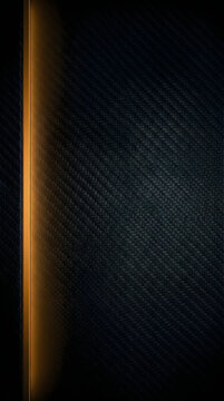 Abstract dark carbon fiber texture background with a vertical glowing orange light strip on the left side, modern luxury design wallpaper with metallic weave pattern uiux background