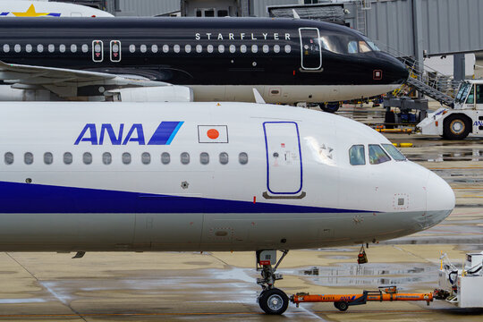 An All Nippon Airways (ANA) Airbus A321 and a Starflyer aircraft at the gates of Fukuoka Airport on August 8, 2020 in Fukuoka, Japan.