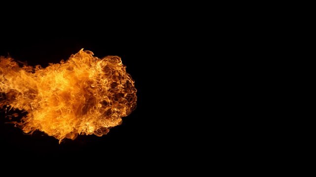 Fire blast explosion in slowmo at dark studio background with powerful hot flame effect for cinematic action vfx asset